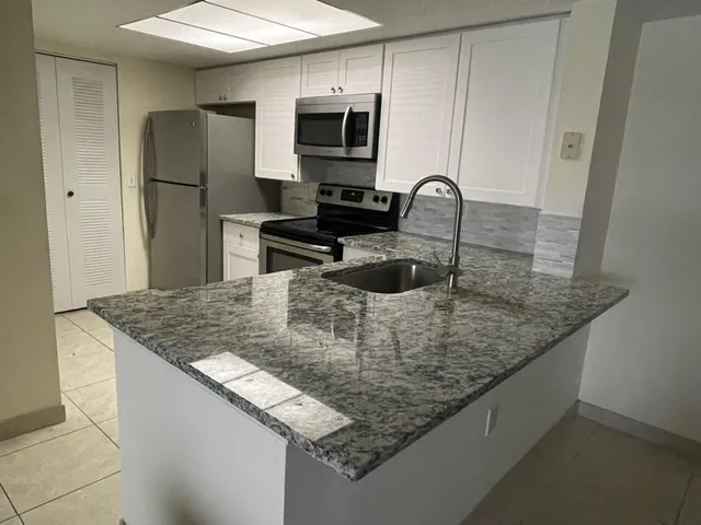 $290,000 | 5045 Wiles Road, Unit 308, Coconut Creek, FL 33073