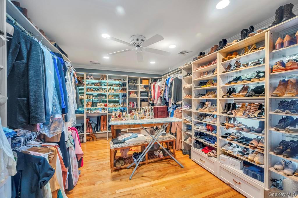 30 Fox Hollow Ridings Road Northport, NY 11768 - Photo 16 of 50 a reading room with lots of furniture and a book shelf