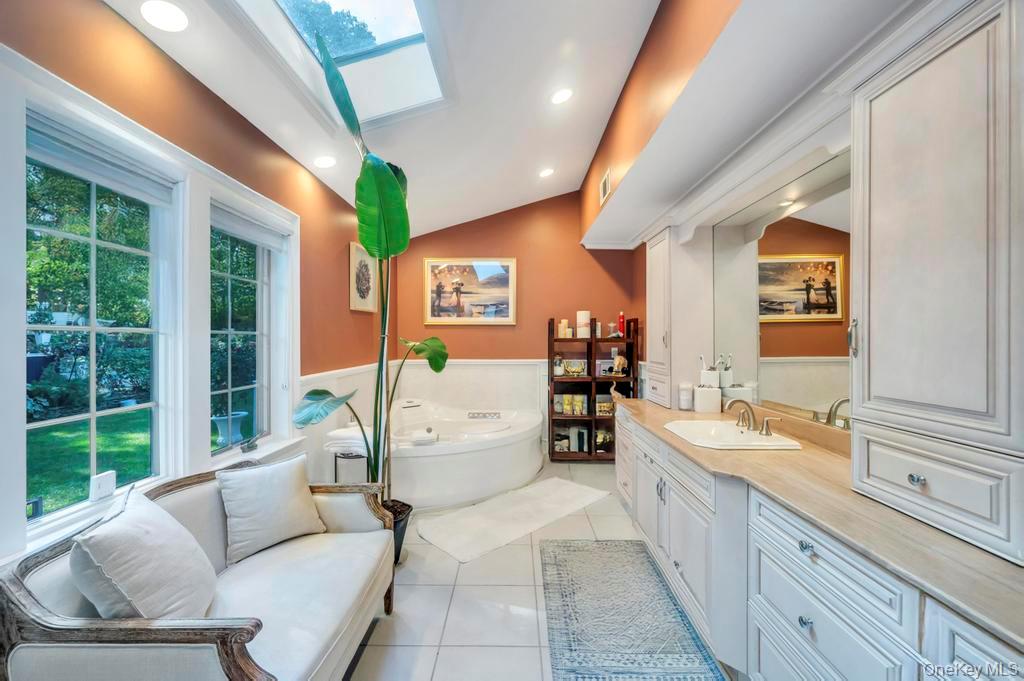 30 Fox Hollow Ridings Road Northport, NY 11768 - Photo 17 of 50 a living room with furniture and large windows