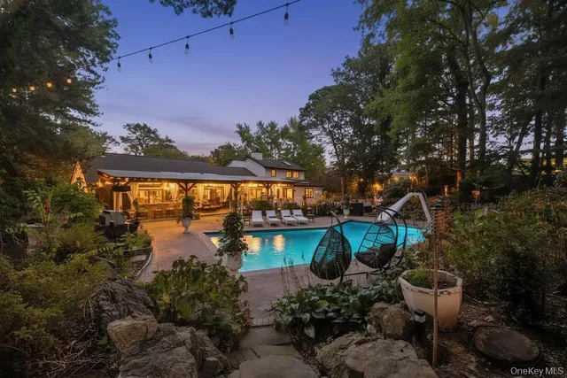 an outdoor space with lounge chair