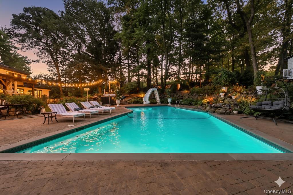 30 Fox Hollow Ridings Road Northport, NY 11768 - Photo 37 of 50 an outdoor space with lounge chair