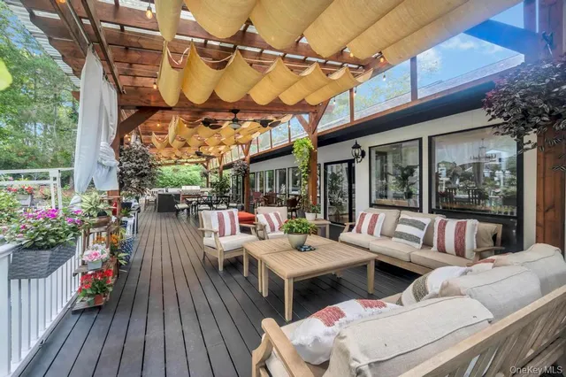 a view of a patio with a table chairs and a patio