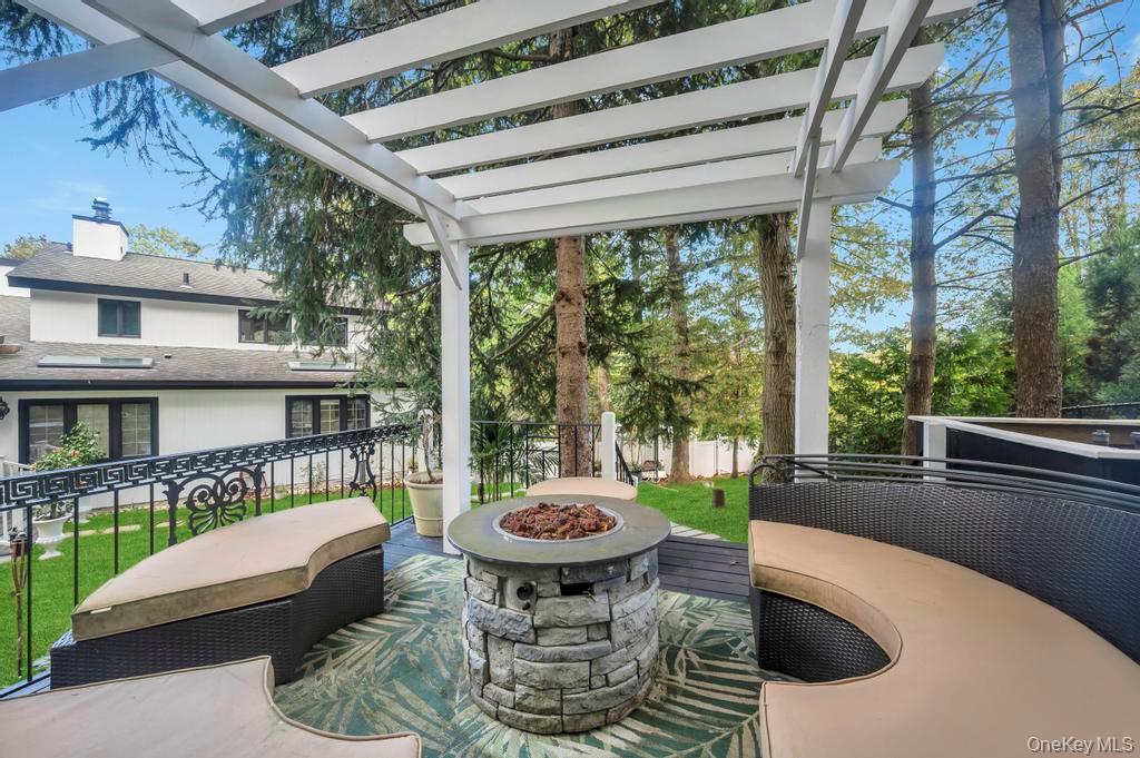 30 Fox Hollow Ridings Road Northport, NY 11768 - Photo 46 of 50 a view of a patio in the backyard