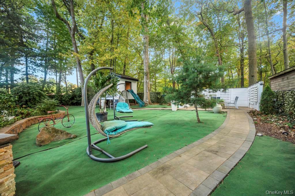 30 Fox Hollow Ridings Road Northport, NY 11768 - Photo 48 of 50 a view of a park with a slide