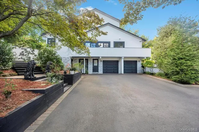 a living room with fireplace furniture and a flat screen tv