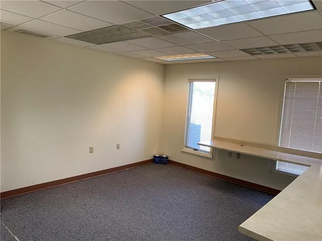 a view of a living room with furniture