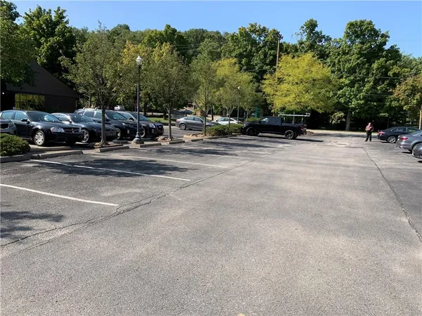 a picture of a bathroom with a shower