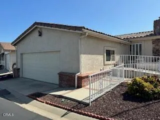 a house view with a garden space