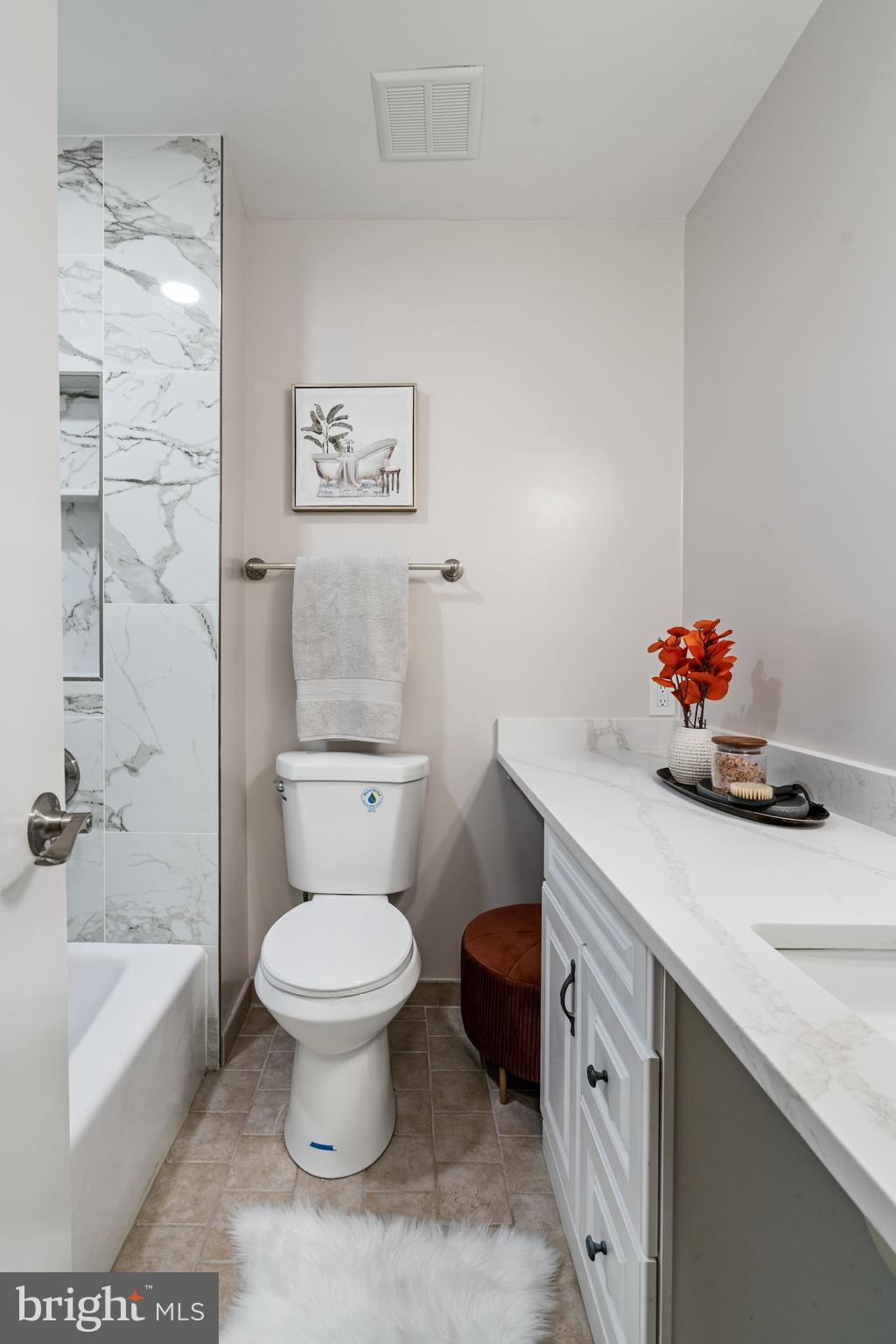 2192 Golf Course Drive Reston, VA 20191 - Photo 19 of 125 a bathroom with a sink toilet and shower