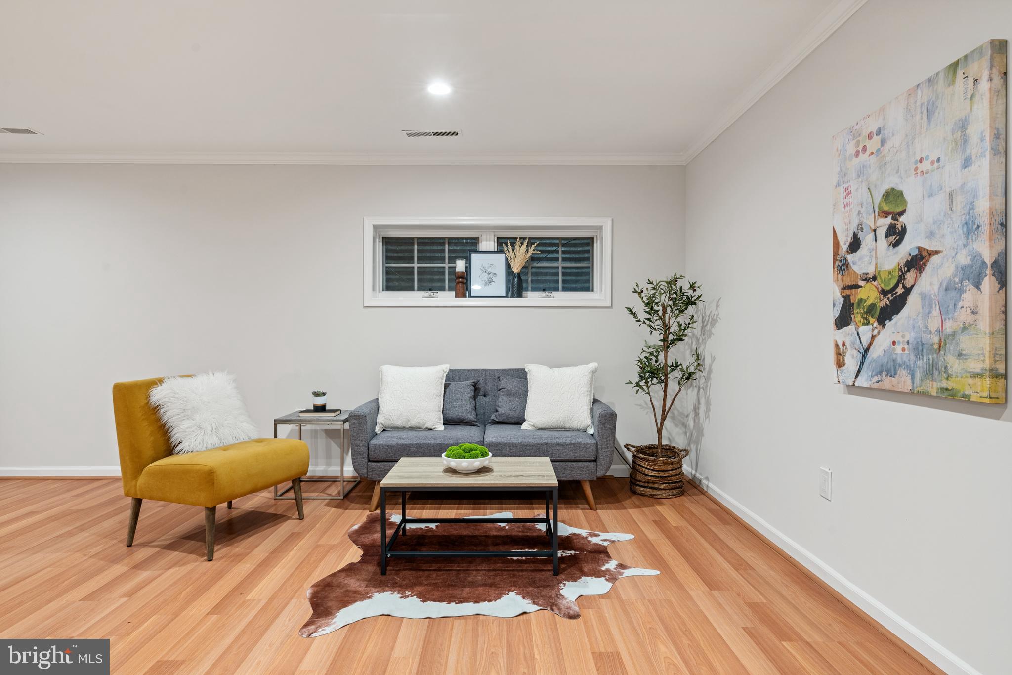 2192 Golf Course Drive Reston, VA 20191 - Photo 30 of 125 a living room with furniture and a rug