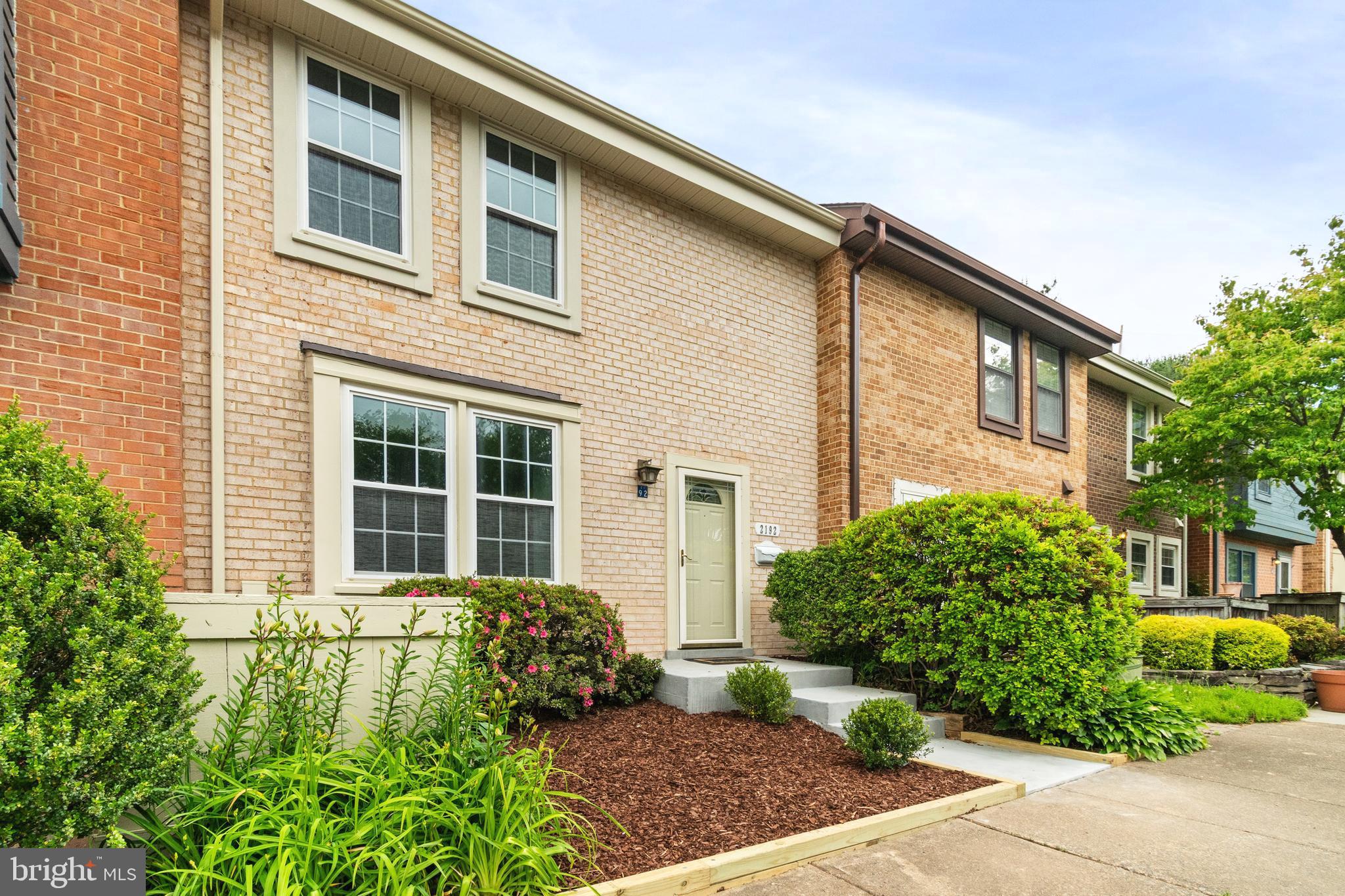 2192 Golf Course Drive Reston, VA 20191 - Photo 3 of 125 a house view with a garden space