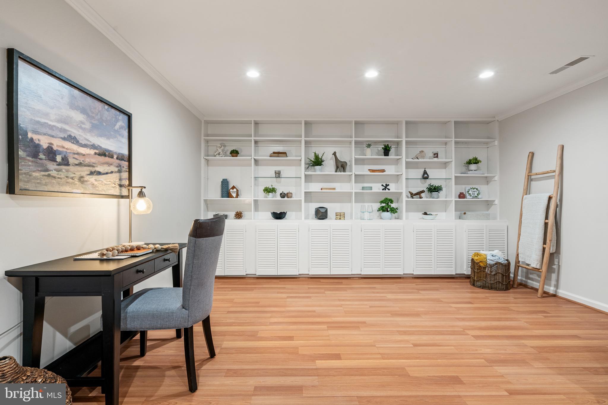 2192 Golf Course Drive Reston, VA 20191 - Photo 31 of 125 a view of a workspace with furniture and wooden floor