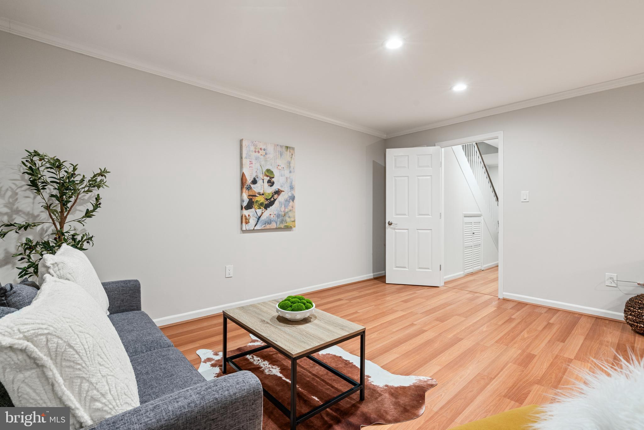 2192 Golf Course Drive Reston, VA 20191 - Photo 32 of 125 a living room with furniture and wooden floor