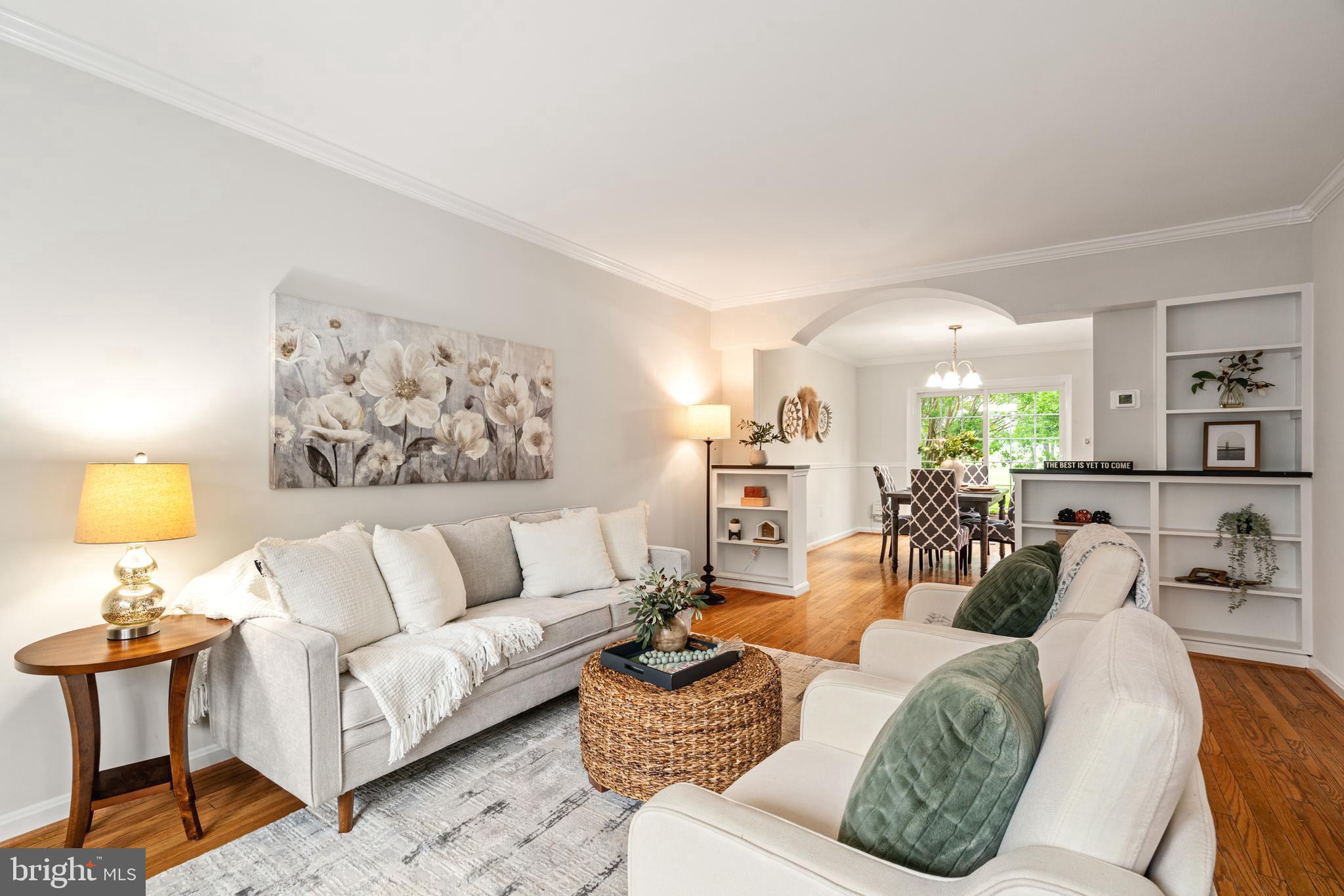 2192 Golf Course Drive Reston, VA 20191 - Photo 7 of 125 a living room with furniture and a painting