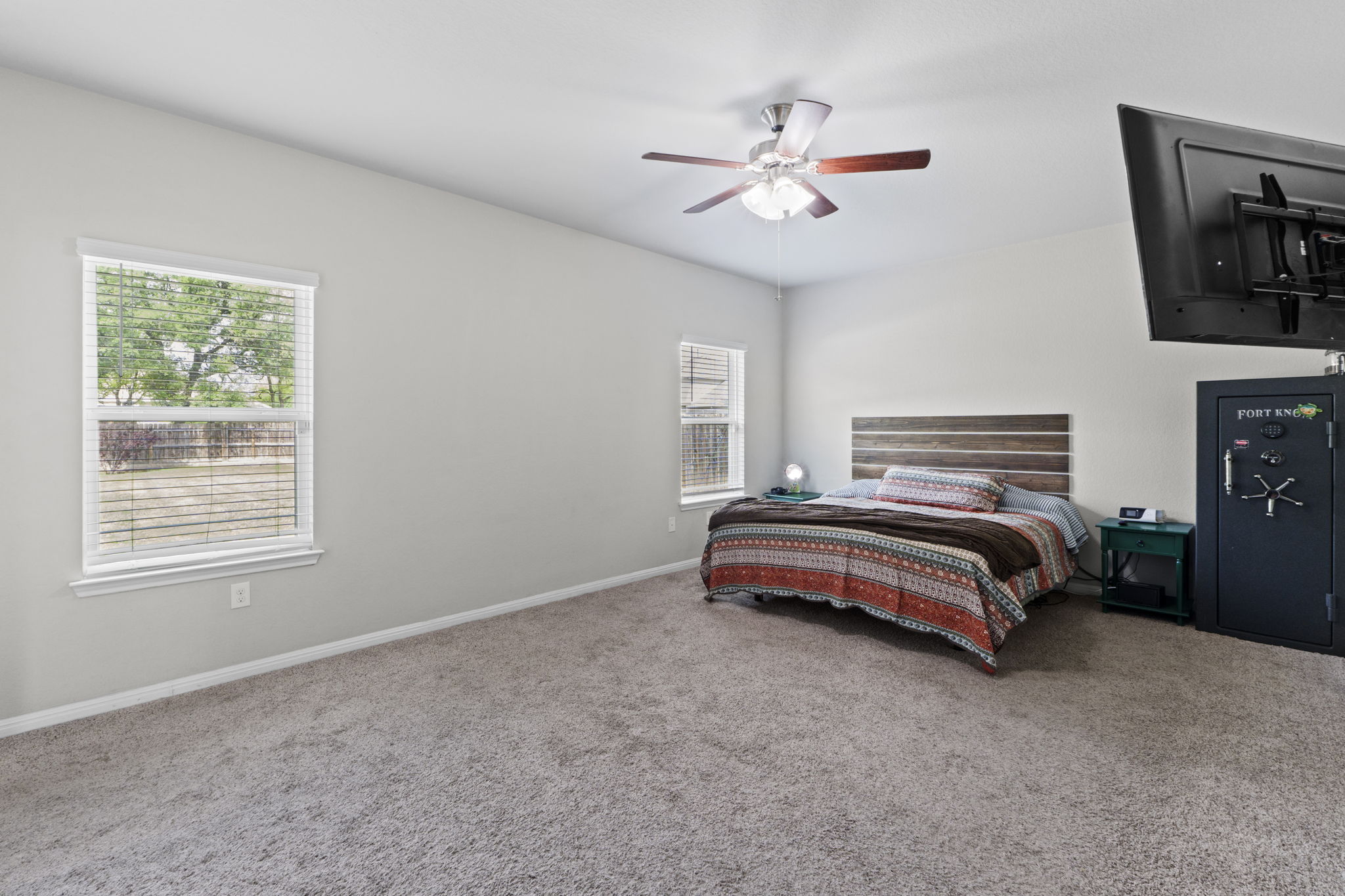 2417 Bridges Ranch Road Georgetown, TX 78628 - Photo 7 of 36 Bedroom featuring carpet and a ceiling fan