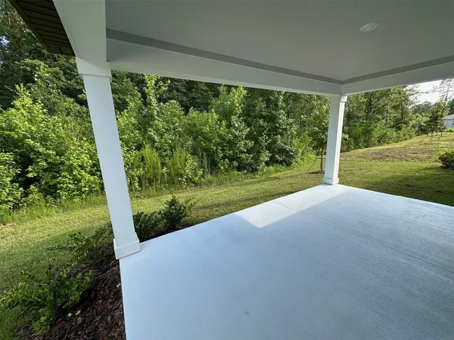 a view of a yard with porch
