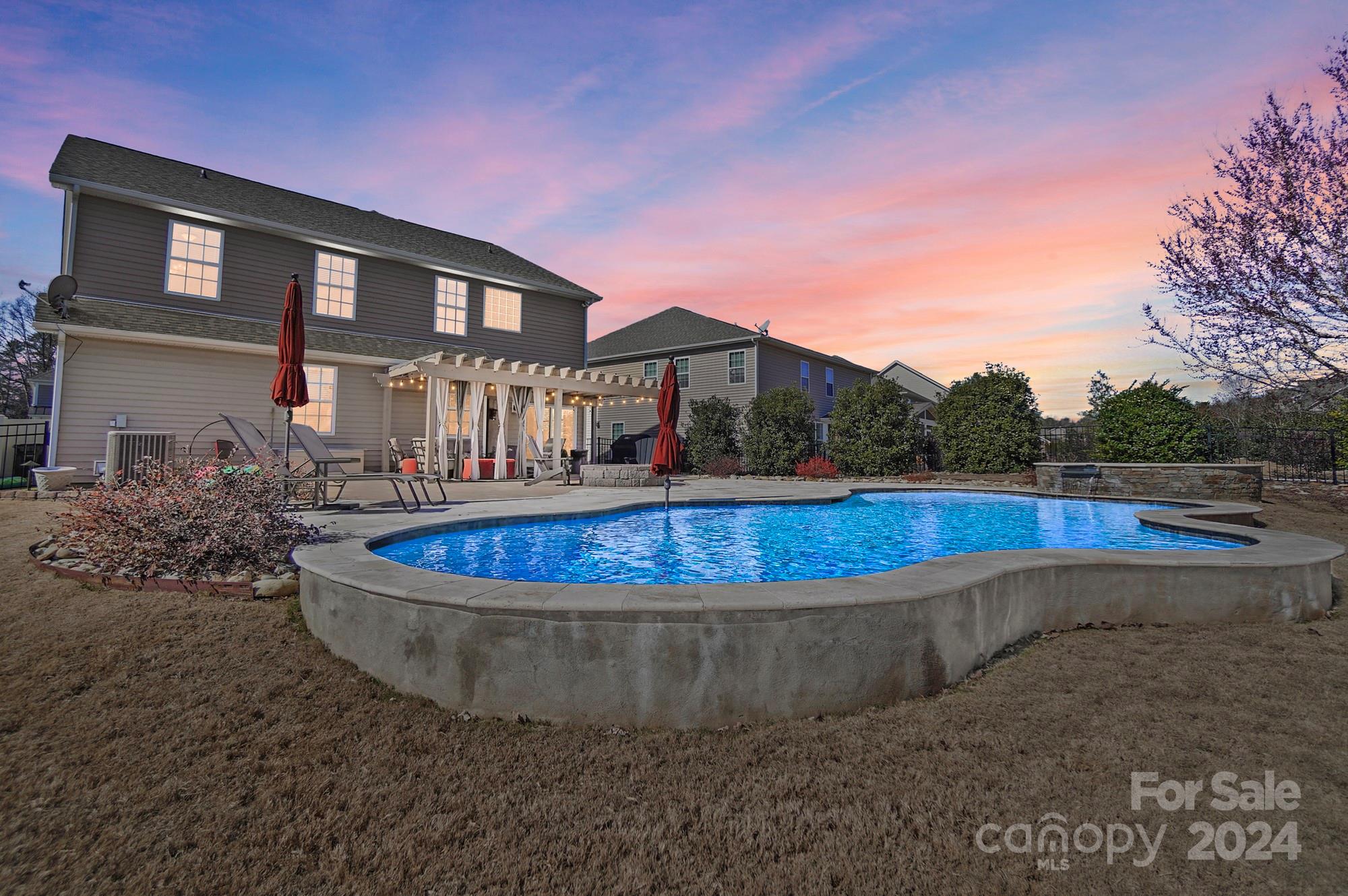 a view of outdoor space yard and swimming pool