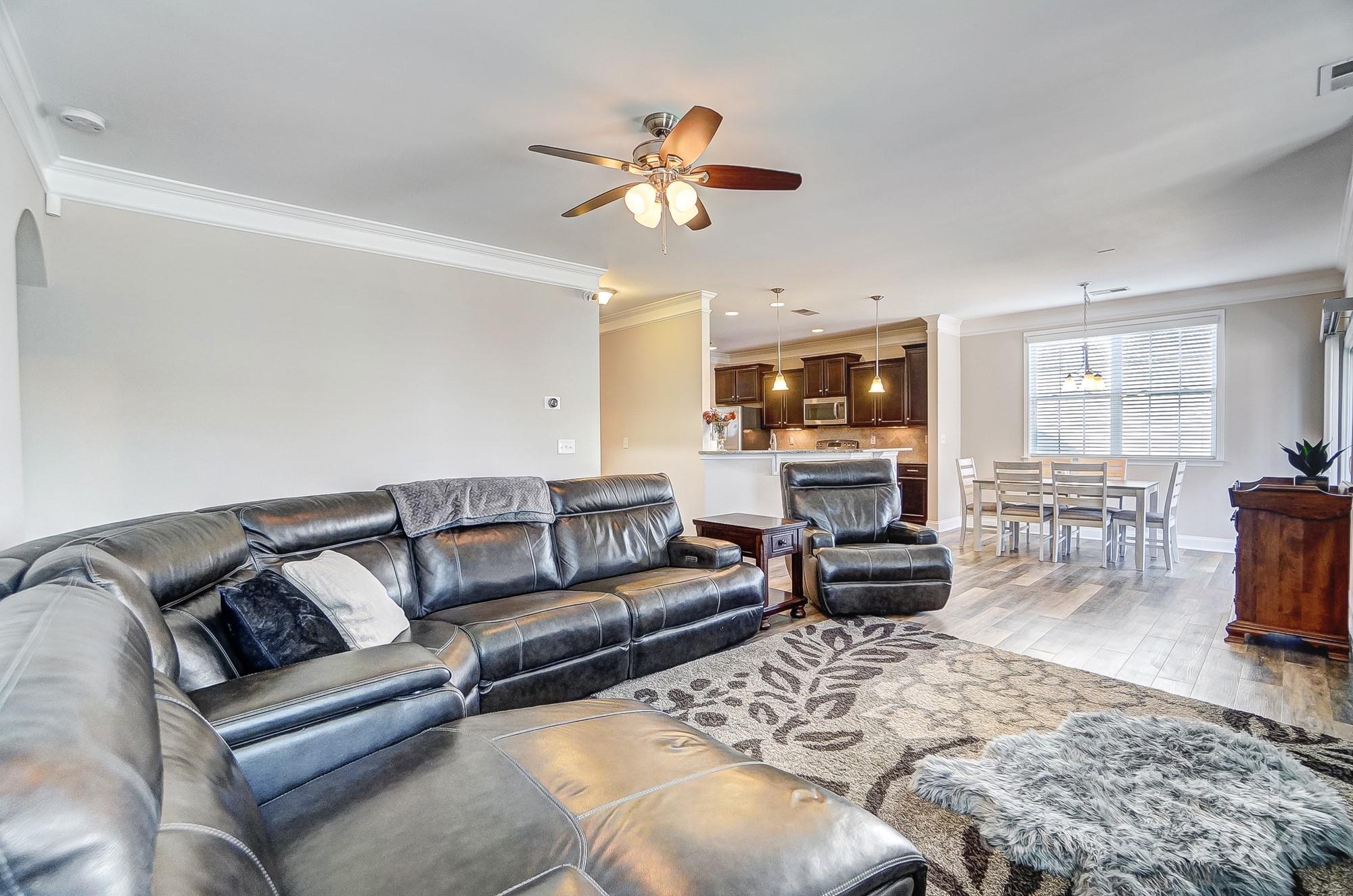 156 Annatto Way Tega Cay, SC 29708 - Photo 12 of 48 a living room with furniture and a large window