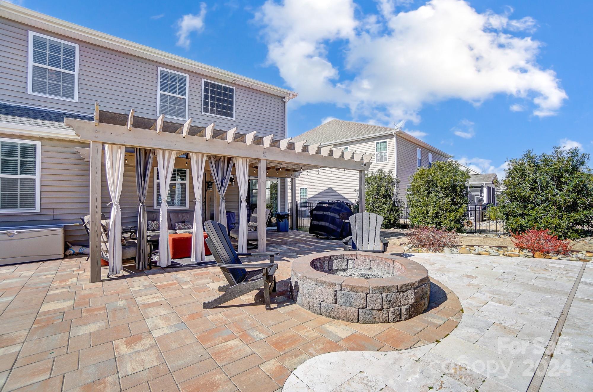 156 Annatto Way Tega Cay, SC 29708 - Photo 24 of 48 a view of a building with sitting area and roof