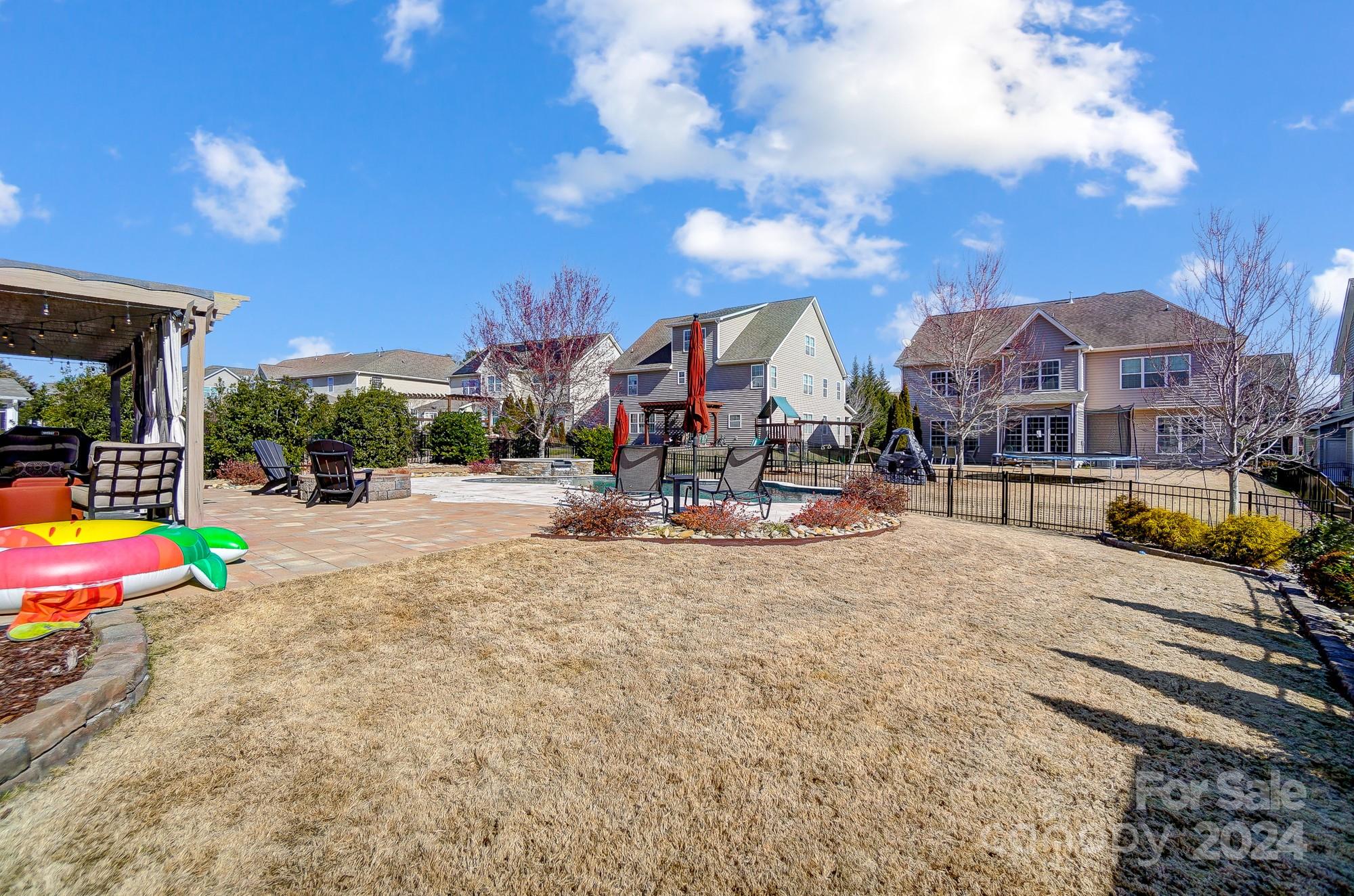 156 Annatto Way Tega Cay, SC 29708 - Photo 27 of 48 a view of the street with houses