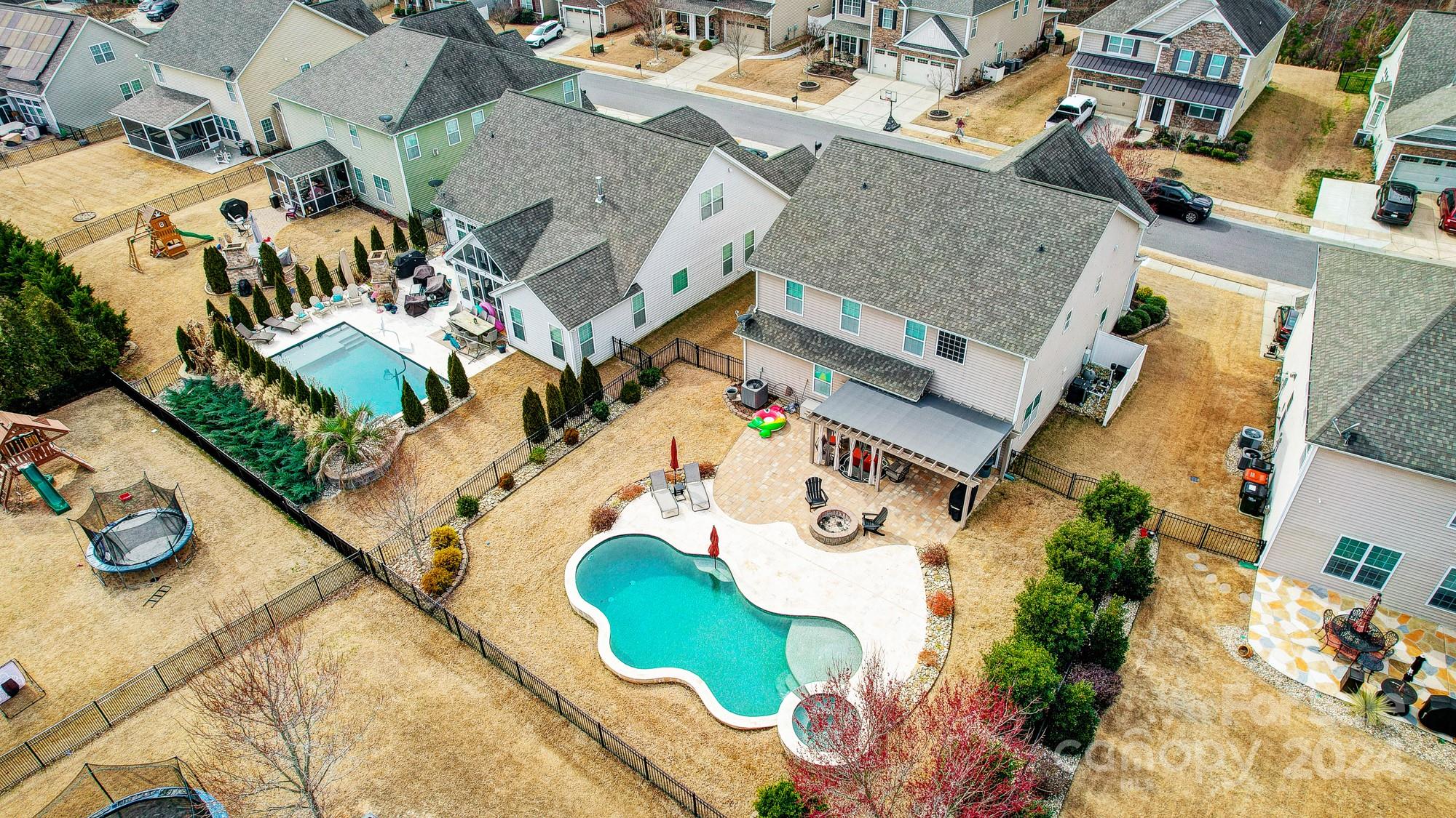 156 Annatto Way Tega Cay, SC 29708 - Photo 34 of 48 an aerial view of a house with a swimming pool