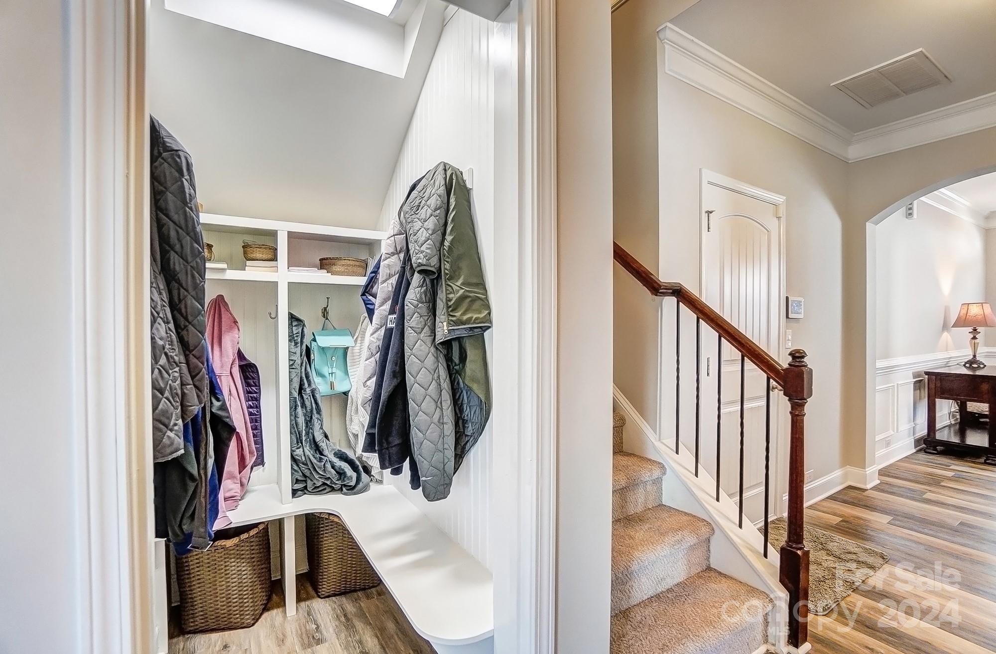 156 Annatto Way Tega Cay, SC 29708 - Photo 7 of 48 a view of a bedroom with stairs
