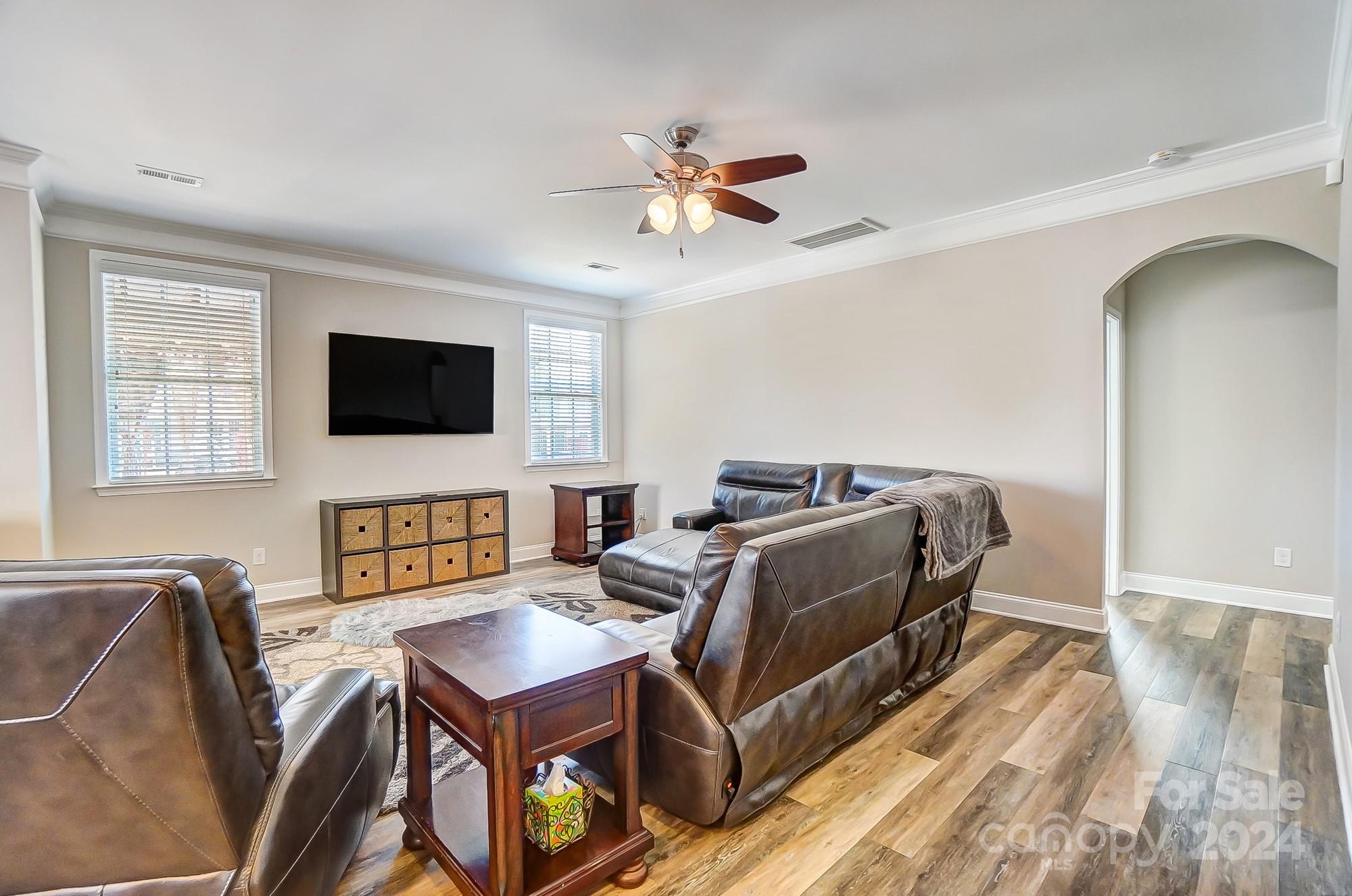 156 Annatto Way Tega Cay, SC 29708 - Photo 10 of 48 a bedroom with furniture and a flat screen tv