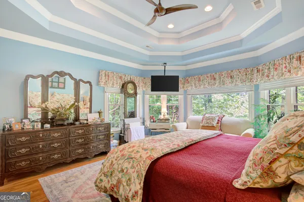 a bathroom with a granite countertop sink mirror and a vanity