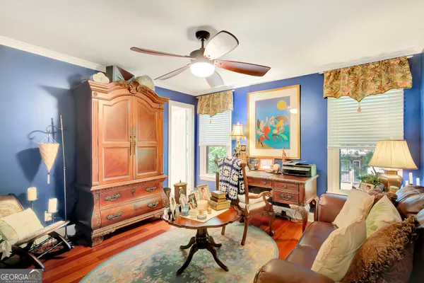 a bathroom with a sink vanity and a mirror