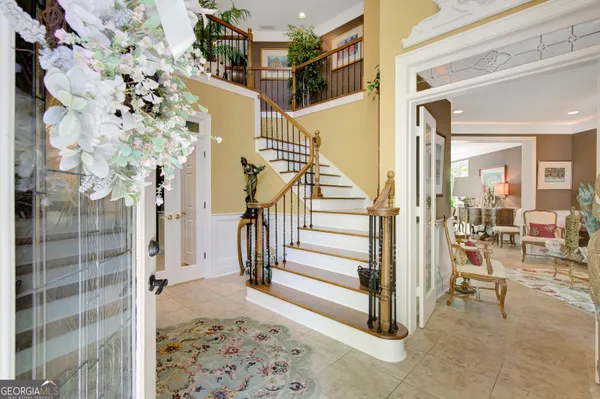 a view of entryway with livingroom and glass door