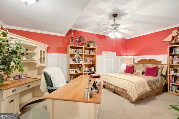 a living room with furniture or wooden floor and a chandelier