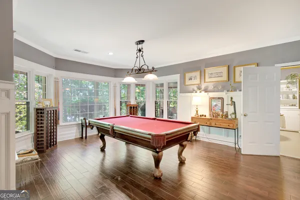 a kitchen with stainless steel appliances a stove and a refrigerator