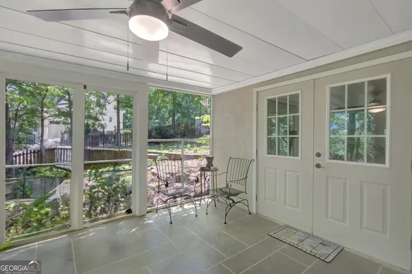 a view of yard with patio