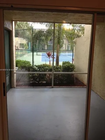 a view of backyard with green space