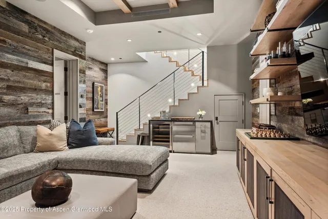 a kitchen with furniture and a stove