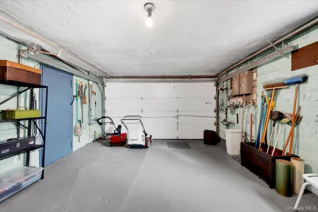 a living room with kitchen island furniture and a window
