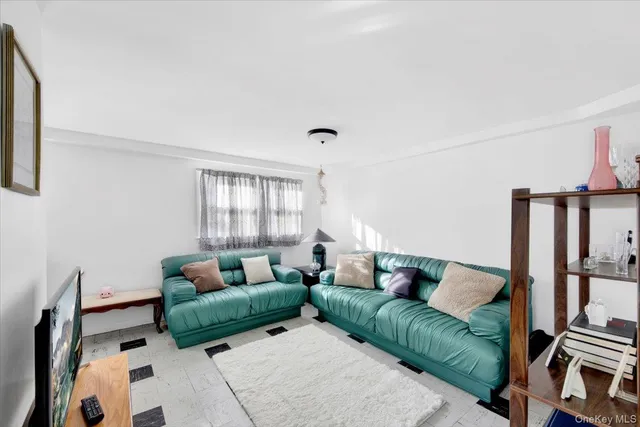 a view of livingroom with furniture and a fireplace