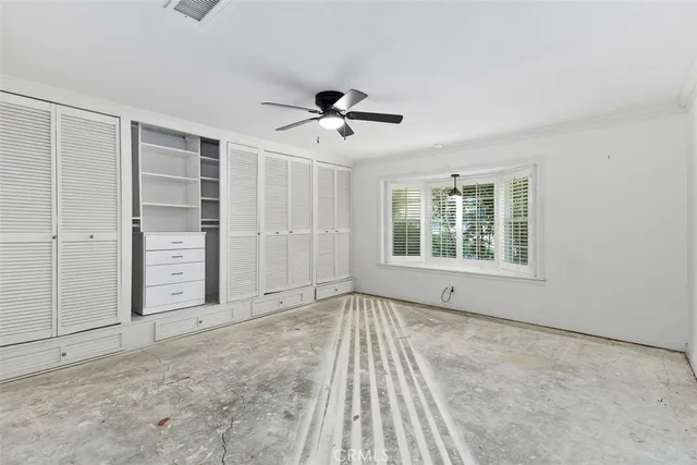 a bathroom with a granite countertop sink mirror and shower