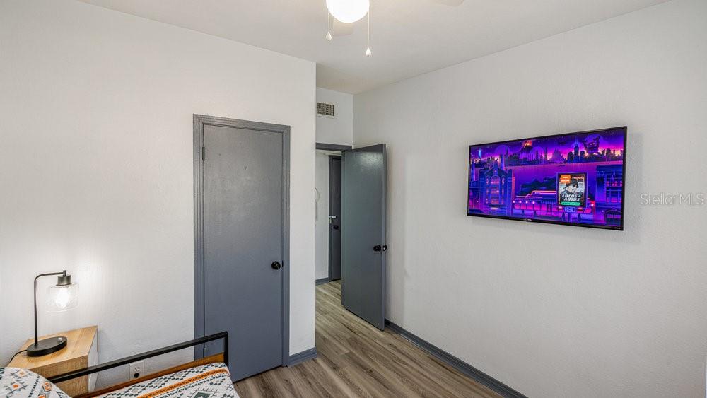 1406 South Conway Road Orlando, FL 32812 - Photo 18 of 30 a view of a room with wooden floor