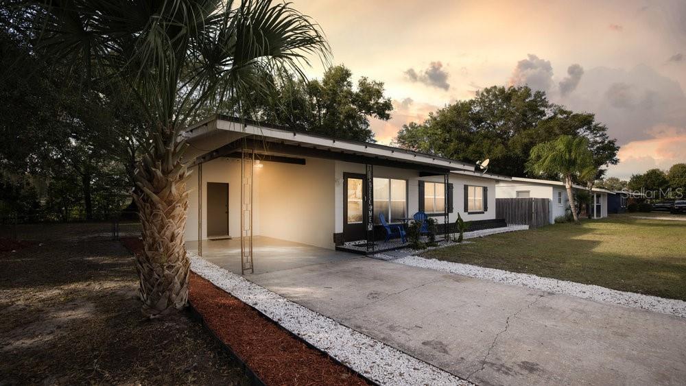 1406 South Conway Road Orlando, FL 32812 - Photo 28 of 30 a view of a house with backyard and garden