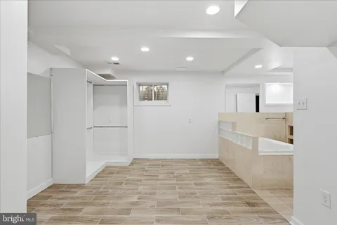 a view of staircase and wooden floor