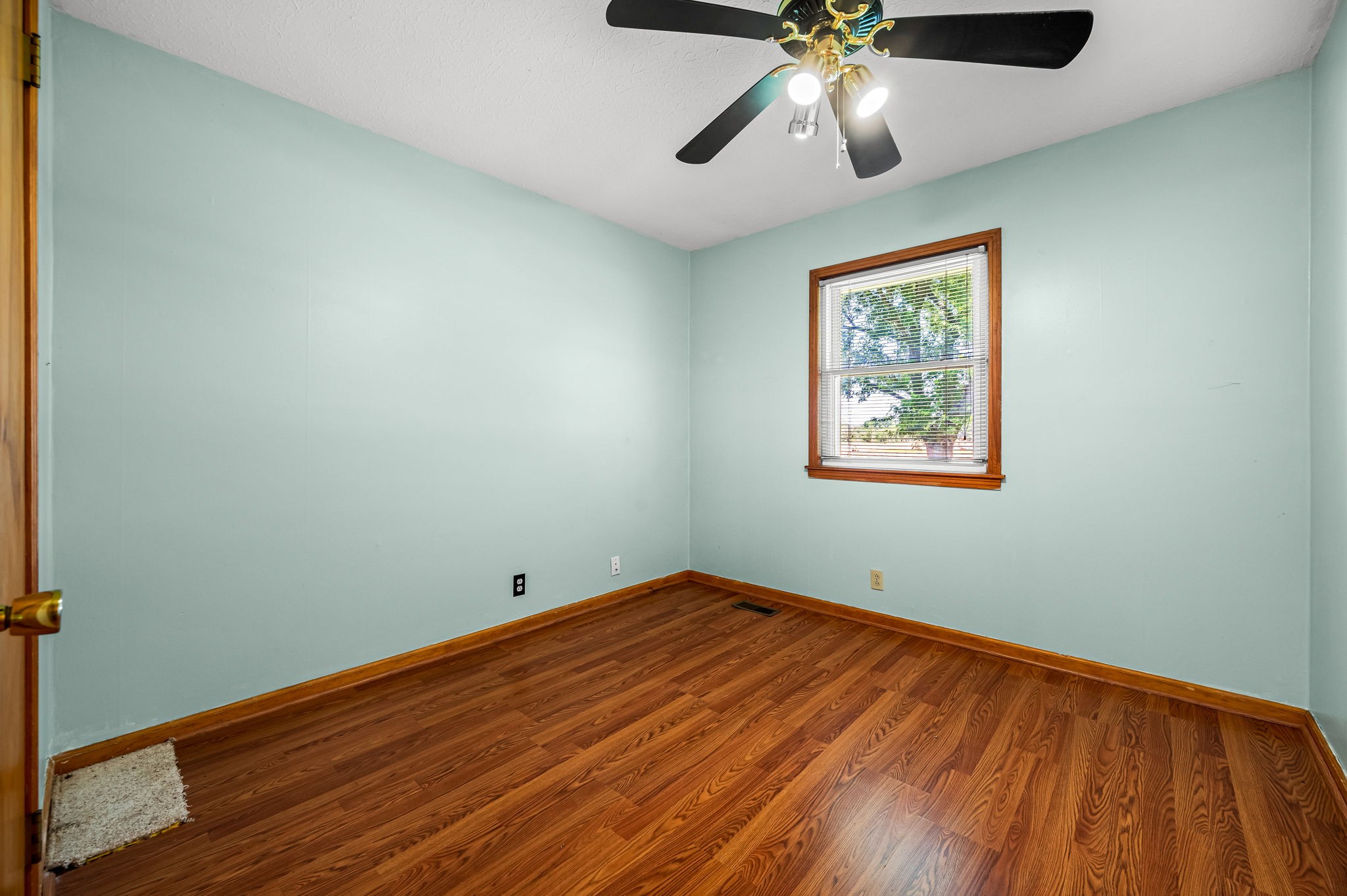 324 Jim Courtney Road Portland, TN 37148 - Photo 11 of 28 a view of empty room with wooden floor