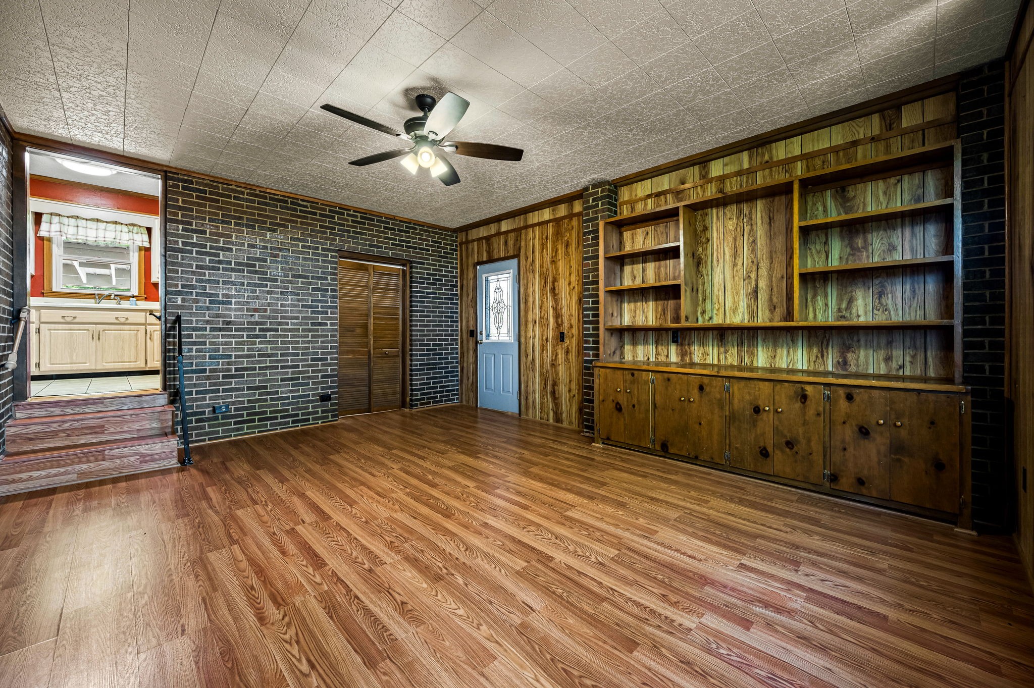 324 Jim Courtney Road Portland, TN 37148 - Photo 17 of 28 a view of empty room with wooden floor and fan