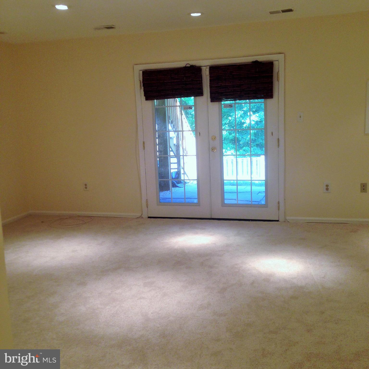 7933 Pebble Brook Court Springfield, VA 22153 - Photo 13 of 18 an empty room with windows
