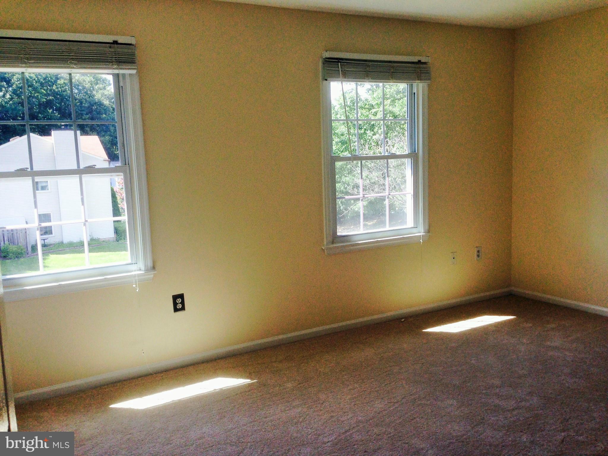 7933 Pebble Brook Court Springfield, VA 22153 - Photo 9 of 18 an empty room with a window