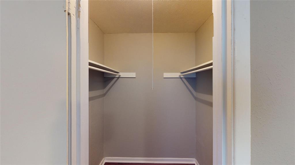 1407 15th Place, Unit A1AHR Plano, TX 75074 - Photo 13 of 14 View of walk in closet
