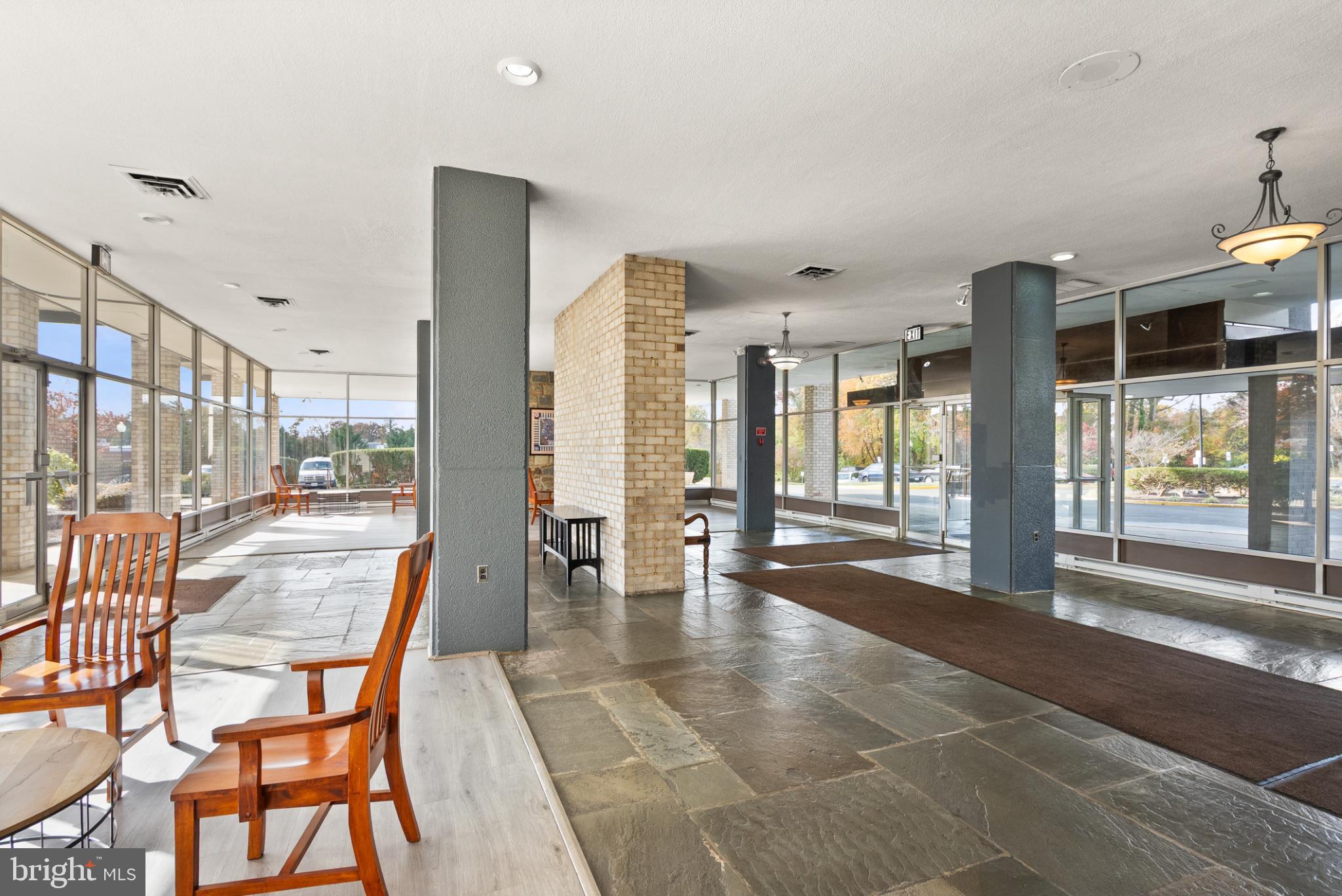 3245 Rio Drive, Unit 608 Falls Church, VA 22041 - Photo 13 of 40 a dining room with furniture and large windows