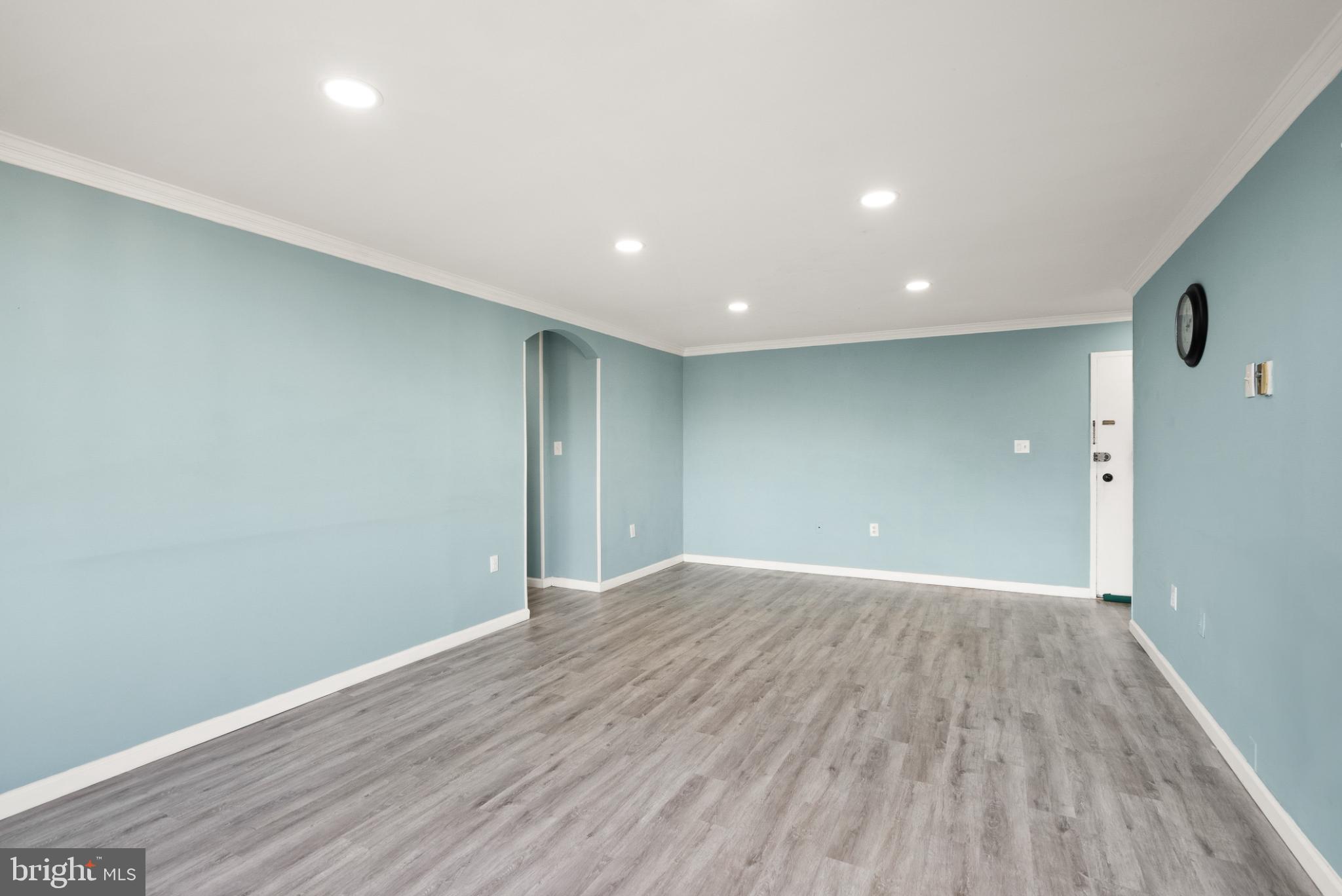 3245 Rio Drive, Unit 608 Falls Church, VA 22041 - Photo 29 of 40 a view of an empty room with wooden floor