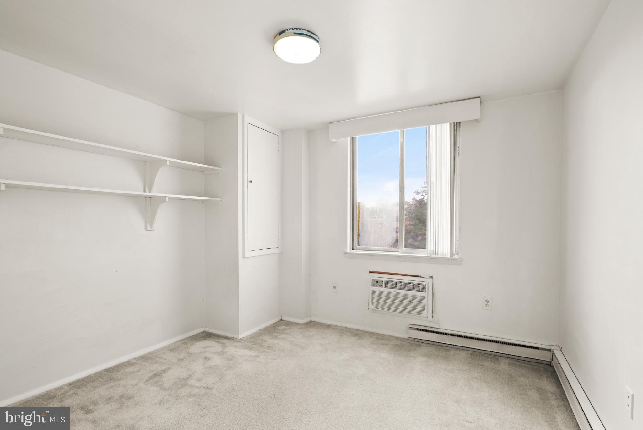 3245 Rio Drive, Unit 608 Falls Church, VA 22041 - Photo 31 of 40 a view of an empty room with a window