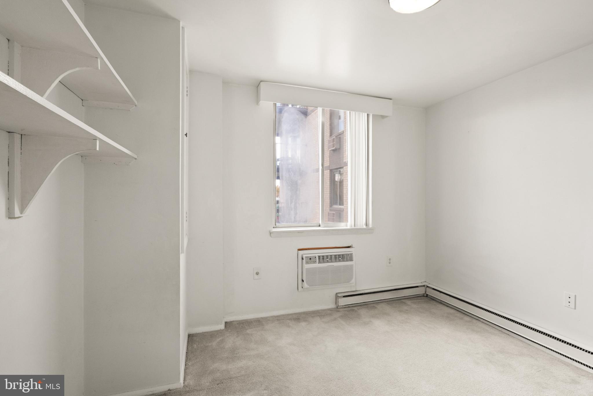 3245 Rio Drive, Unit 608 Falls Church, VA 22041 - Photo 32 of 40 a view of an empty room with a window